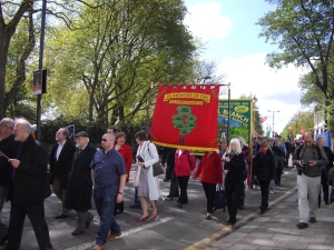 Decendents of the Tolpuddle Martyr's are regulars at the Tolpuddle Festival in Dorset each year. At King's Cross this year they unveiled a brand new banner depicting their family tree.